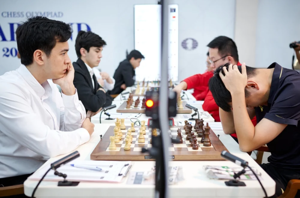 Jugadores de Ajedrez 120 Olympiad Day 7: Two Nodirbeks, one golden mission
